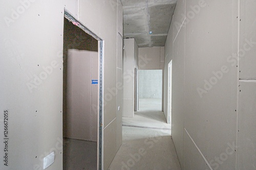 rough repairs for self-finishing. interior decoration, bare walls of the room, stage of construction. interior apartment room