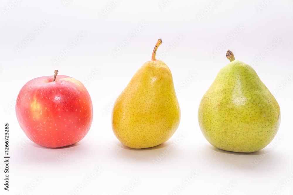 Red apple and two pears on white background, side view Red apple and two pears on white background, side view