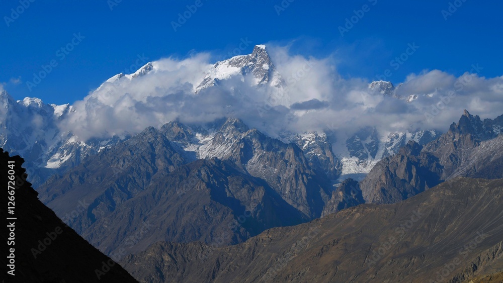 Panoramic view of Ultar Peak (7388 m, also Ultar Sar, Bojohagur Duanasir II) - the southeasternmost major peak of Batura Muztagh, a subrange of the Karakoram range, Pakistan (seen from Hopar Glacier) Panoramic view of Ultar Peak (7388 m, also Ultar Sar, Bojohagur Duanasir II) - the southeasternmost major peak of Batura Muztagh, a subrange of the Karakoram range, Pakistan (seen from Hopar Glacier)