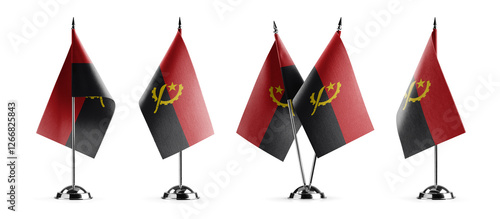 Small national flags of the Angola on a white background photo