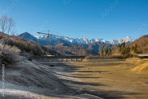 Φωτογραφία Lago di Barcis - Barcis artificial lake drained of water for routine maintenance, in Friuli-Venezia Giulia, north east Italy