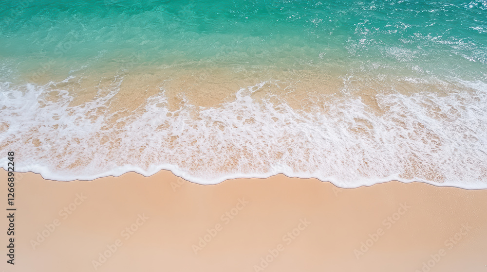 Aerial view of tranquil beach with gentle waves and soft sand Aerial view of tranquil beach with gentle waves and soft sand