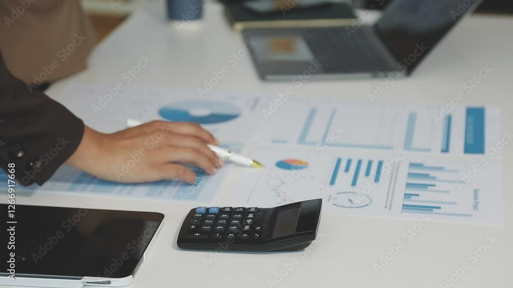 Financial Report Graph Analysis On Tablet In Business Meeting Financial Report Graph Analysis On Tablet In Business Meeting