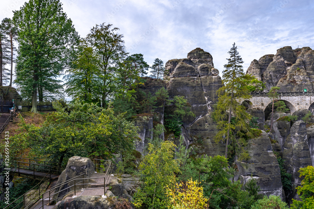 Experience the beauty of Germany’s Elbe Mountains with Saxon Switzerland’s iconic rock formations and dramatic sandstone cliffs Experience the beauty of Germany’s Elbe Mountains with Saxon Switzerland’s iconic rock formations and dramatic sandstone cliffs