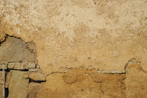 Obraz na płótnie cracked soil wall texture of clay house. w salonie