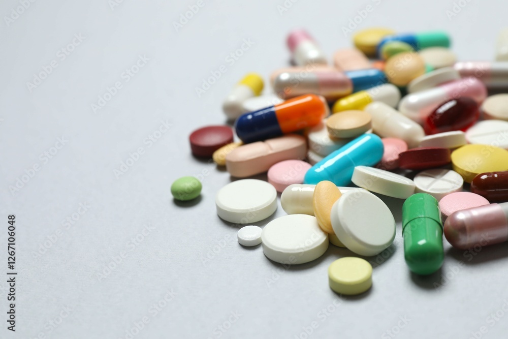 Various pills on gray background Various pills on gray background