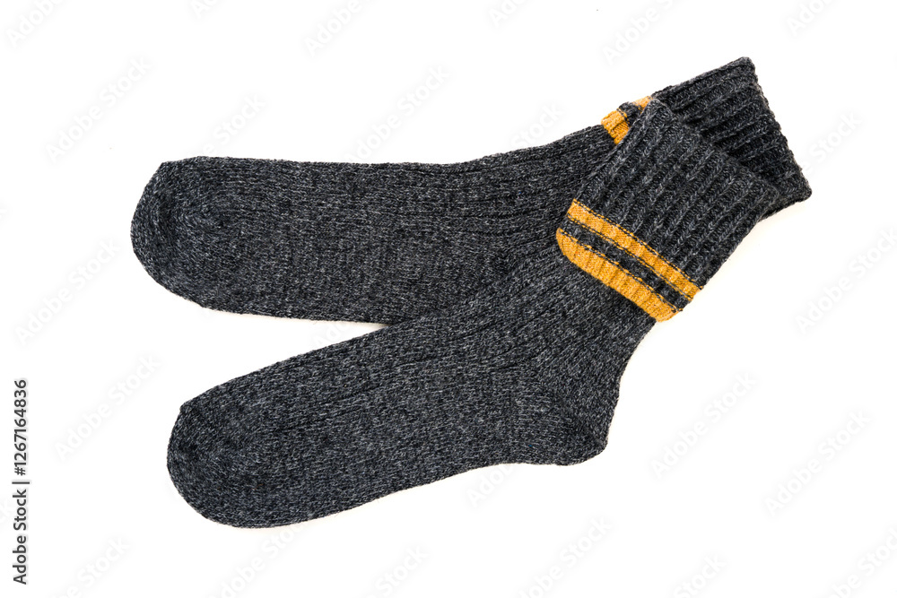 Top view of grey woolen winter socks on white background Top view of grey woolen winter socks on white background