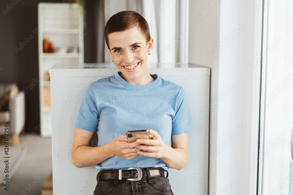 Smiling Woman Using Smartphone in a Relaxed Setting Smiling Woman Using Smartphone in a Relaxed Setting