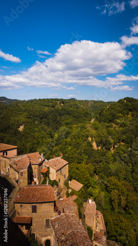 Scenic view to the Tuscany nature from the old medieval houses of the etruscan town of Sorano placed on the hill with o the invites to explore its charming tiny streets