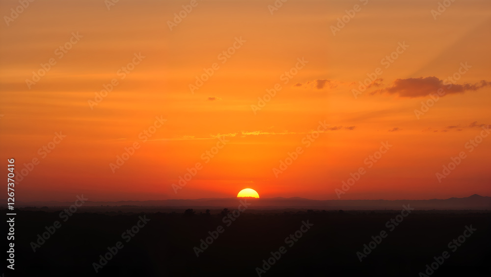 A minimalistic sunset scene with a deep orange sun setting over a dark silhouette landscape. Generative AI A minimalistic sunset scene with a deep orange sun setting over a dark silhouette landscape. Generative AI