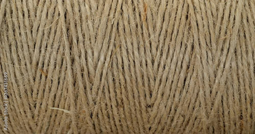 Texture of Natural Jute Twine. High-resolution texture of natural jute twine, showcasing its rough fibers and organic weave.	
