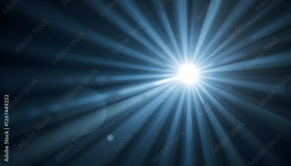 Obraz premium Radiant Light Burst: Abstract Blue Light Rays Emanating from a Central Glow, Creating a Dramatic and Spiritual Atmosphere.