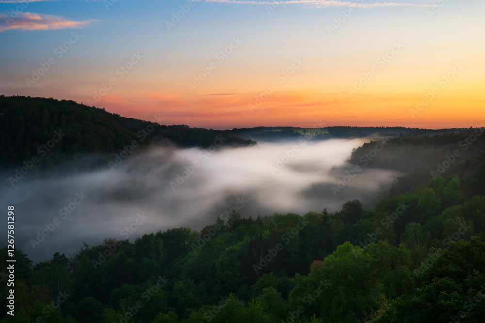 Sunrise Over the Foggy Valley Sunrise Over the Foggy Valley