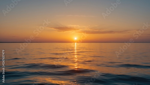 Serene Sunrise Over Calm Waters Reflecting Golden Light in Tranquil Seascape