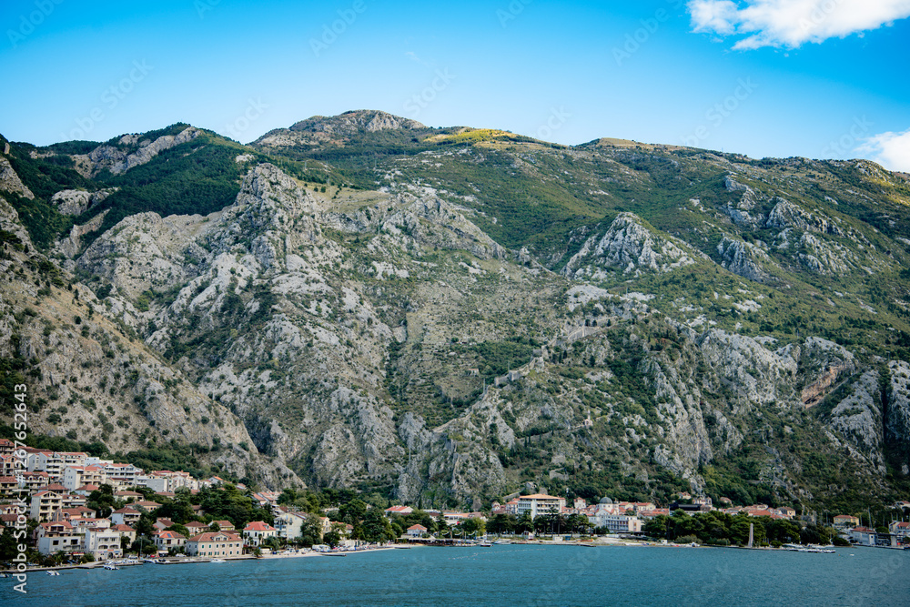 Coastline of Kotor Bay, Montenegro. View from the sea to the old town Coastline of Kotor Bay, Montenegro. View from the sea to the old town