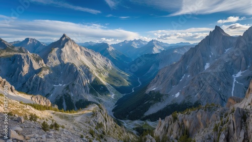 Wallpaper Mural Mountainous landscape with dramatic peaks and valleys under a blue sky with clouds in the background Copy Space Torontodigital.ca