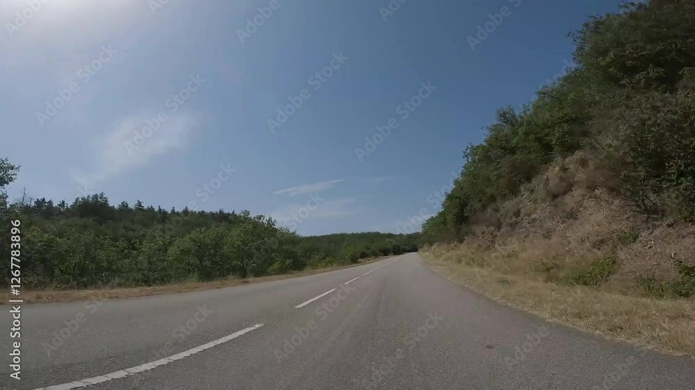 Driving through a typical French landscape. Driver's view. Driving through a typical French landscape. Driver's view.