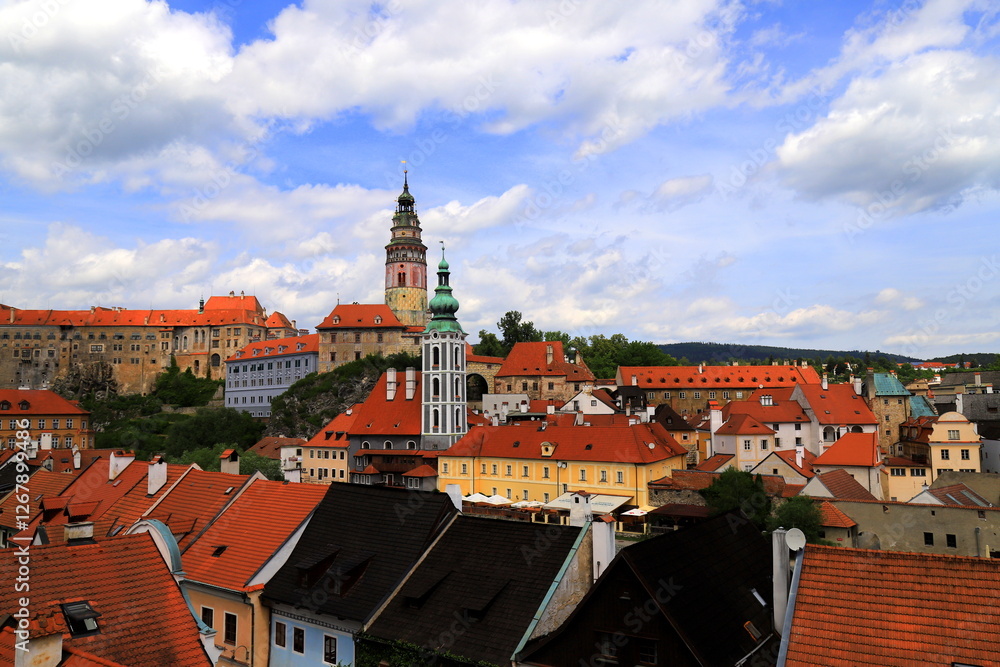 Fototapeta premium Czech Republic, town of Cesky Krumlov. Old tower, historical houses with tiled roofs, gothic buildings, architecture. Panorama of Cesky Krumlov.