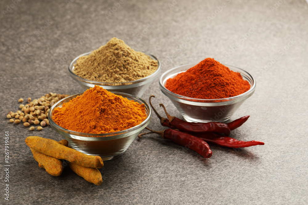 Various spices in a bowls on stone background. Mix spices Indian spices food and cuisine ingredients Various spices in a bowls on stone background. Mix spices Indian spices food and cuisine ingredients