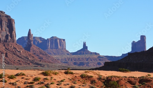 Majestic sandstone formations and scenic beauty of Monument Valley, a Navajo Nation Park spanning across Utah and Arizona is world famous. 