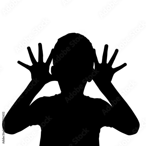 Silhouette of a Boy Making a Funny Face with His Hands – Playful Expression of Humor, Standing Facing Forward with Hands Raised to His Head, Fingers Spread, Symbolizing Childhood Joy and Innocence

