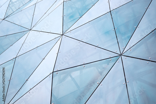 Abstract background in architecture, glass facade of the building.