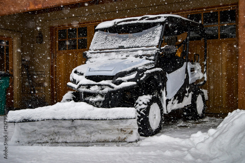 Obraz na plátně Fresh snow on a snow plow during a blizzard on a snowy day in the winter in Dura