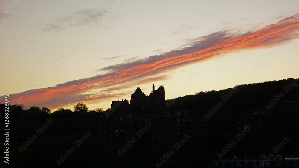 Fototapeta premium Sunset with red widespread sheet of cloud