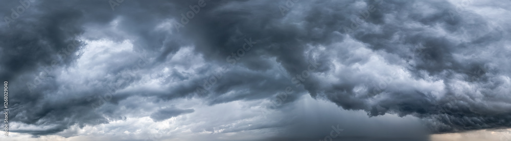 Dramatic Stormy Sky with Dark Heavy Clouds During a Thunderstorm Dramatic Stormy Sky with Dark Heavy Clouds During a Thunderstorm