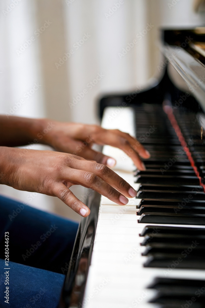 Fototapeta premium Close-up of woman playing piano