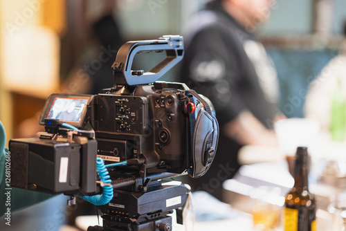 old movie camera on tripod