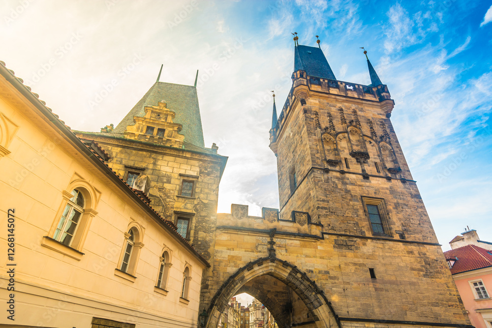 Fototapeta premium A captivating view of Charles Bridge in Prague, Czech Republic, showcasing its intricate stone carvings, towering Gothic arches, and historic statues, reflecting the craftsmanship of this old town