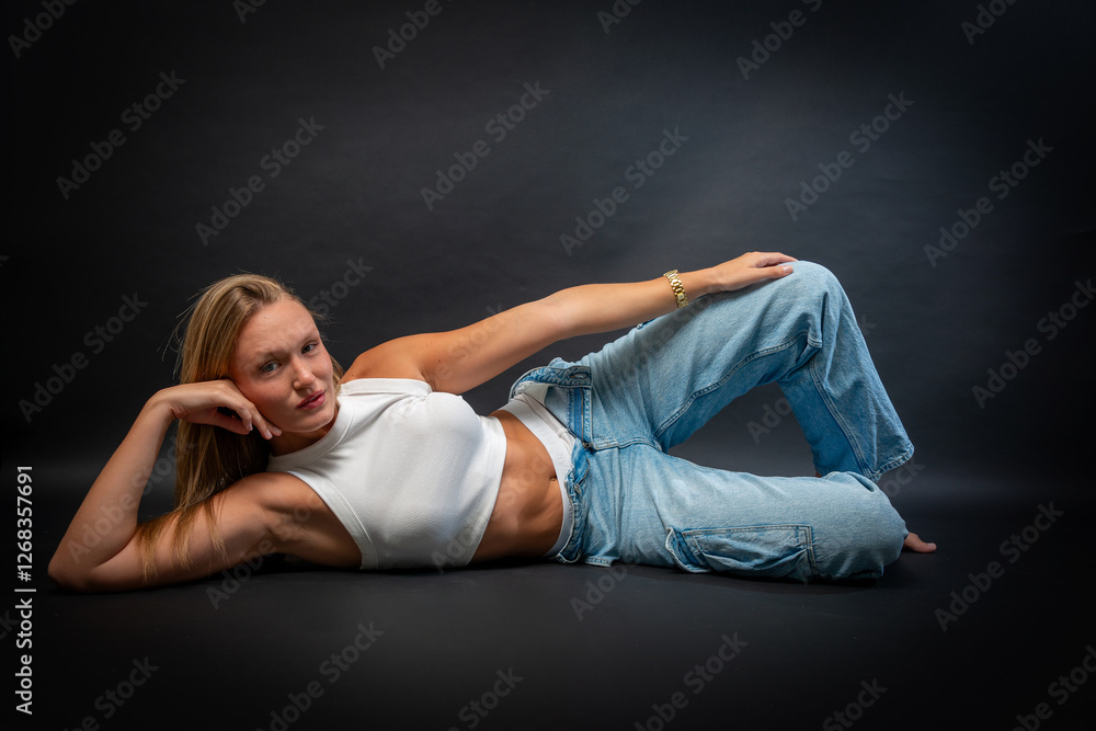 Blonde Woman in Sleeveless White Shirt and Blue Jeans Blonde Woman in Sleeveless White Shirt and Blue Jeans