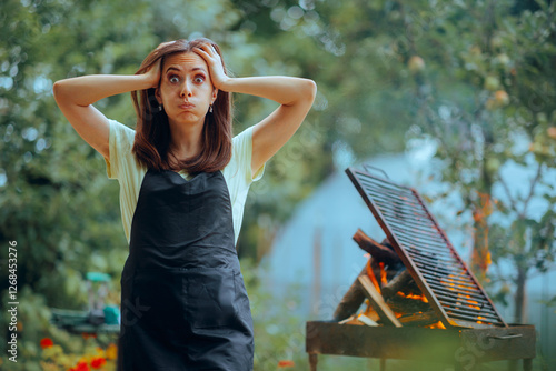 Vászonkép Stressed Woman Worried about Wood Burning on Barbecue Fire