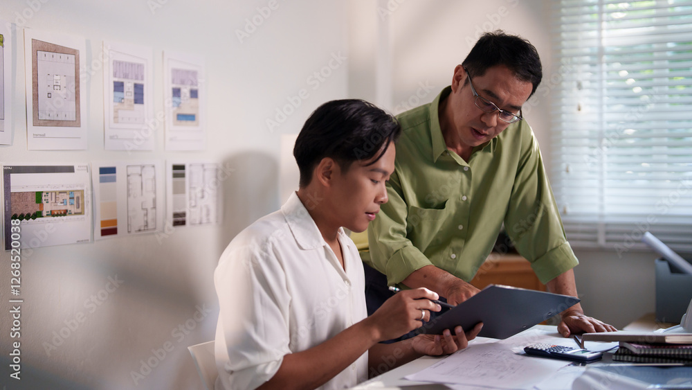 Obraz premium A detailed discussion between engineers about building requirements and material optimization for a large project