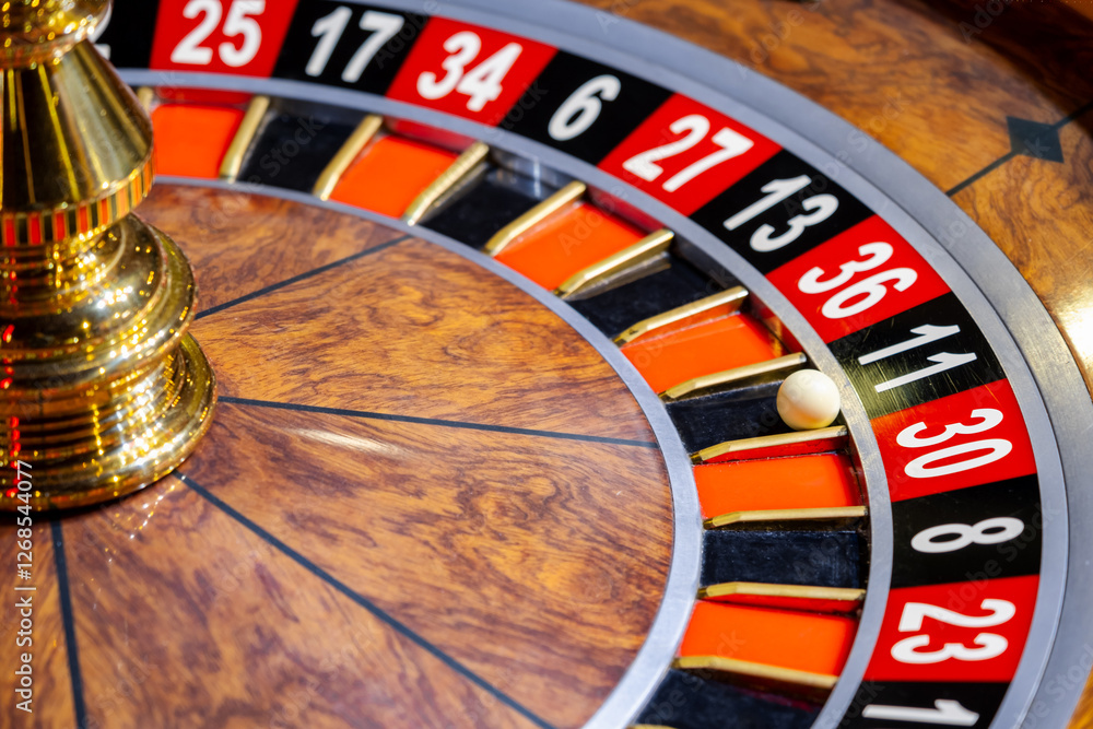 Roulette wheel. Casino. Gambling game. Roulette wheel on table in a casino. Roulette. The game in the casino. The concept of expectation of good luck. Roulette wheel. Casino. Gambling game. Roulette wheel on table in a casino. Roulette. The game in the casino. The concept of expectation of good luck.