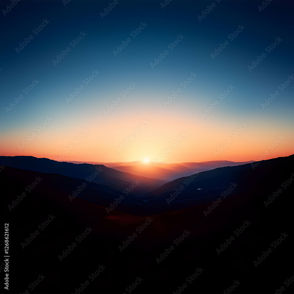 Fototapeta premium Vibrant Sunset Over Silhouetted Mountains