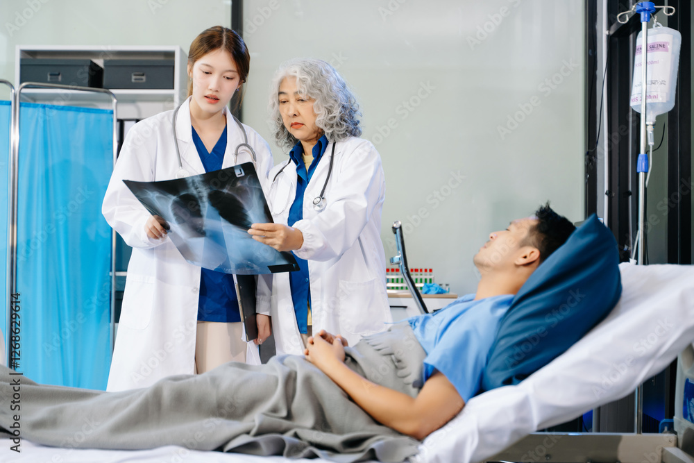 Fototapeta premium Hospital Ward Male and Male Professional Asian Doctors Talk with a Patient, Give Health Care Advice,