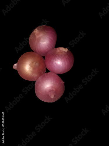 Fresh Red Onions Isolated on Black Background. Perfect for chefs, food bloggers, and designers working on organic and farm-fresh concepts.