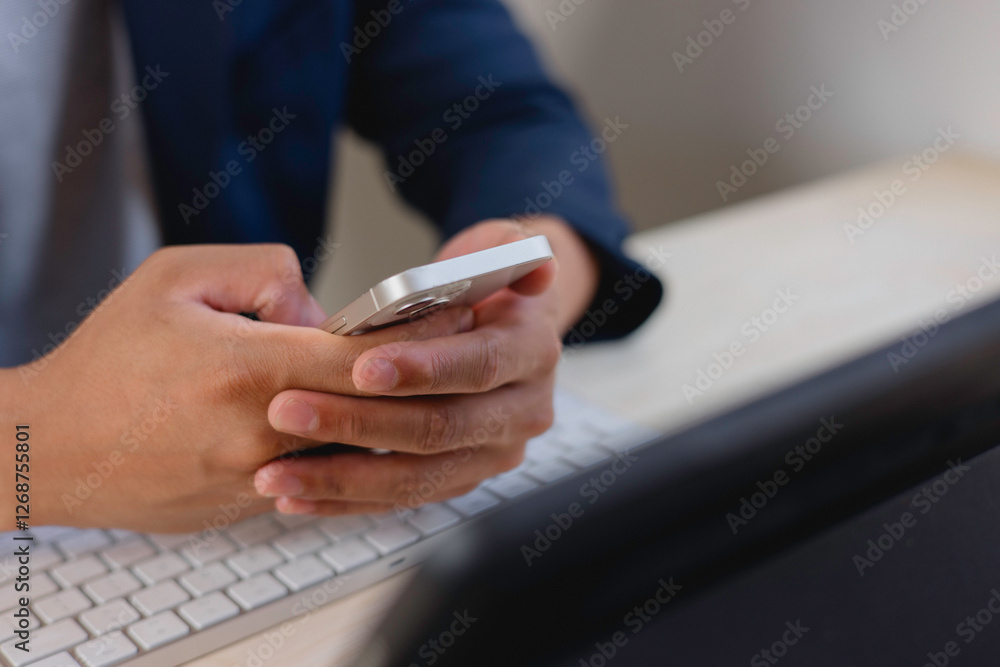 Fototapeta premium Social media and digital online concept, man using smart phone. The concept of living on vacation and playing social media. Social Distancing ,Working From Home