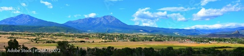The Spanish Peaks are a pair of prominent mountains located in southwestern Huerfano County, Colorado. The Spanish Peaks were designated a National Natural Landmark in 1976.