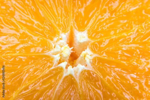 Obraz na płótnie Oranges cut in half, cross-section, flesh.
w salonie