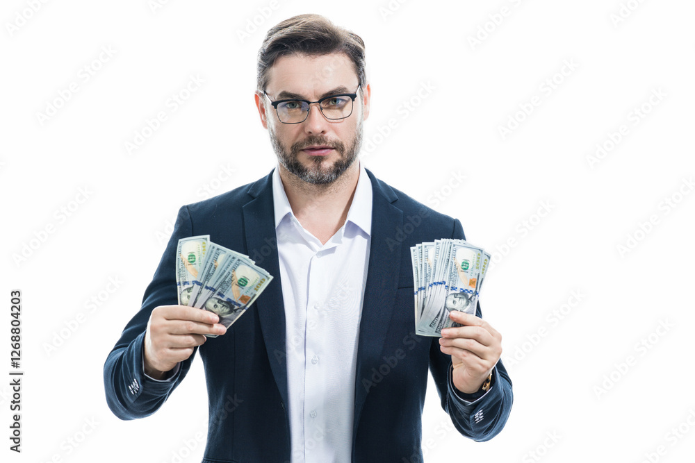 Man in suit holding cash money in dollar banknotes on isolated white background. Studio portrait of businessman with dollar banknotes. Dollar money. Career wealth business. Cash dollar concept. Man in suit holding cash money in dollar banknotes on isolated white background. Studio portrait of businessman with dollar banknotes. Dollar money. Career wealth business. Cash dollar concept.