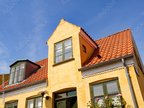 Historic yellow townhouse with red-tiled roof at Strandgade in Dragør Old Town, Amager Island, Capital Region, Denmark