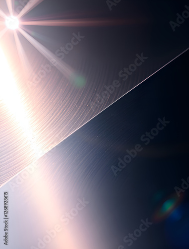  Futuristic hi-tech style background featuring a close-up image of a steel smooth and sharp metal surface. Perfect for technology, innovation or cyberpunk style design.