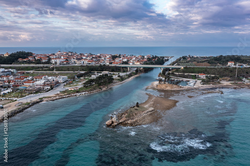 Aerial view at Nea Potidea canal, which connects Toroneos Bay with the Gulf of Thermaikos. Greece, Kassandra, Halkidiki photo