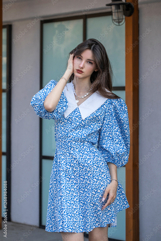 Fototapeta premium Portrait of a young beautiful brunette girl