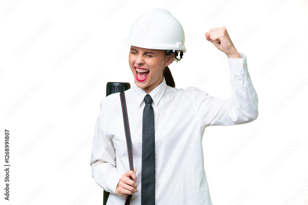 Young architect woman with helmet and holding blueprints over isolated background celebrating a victory Young architect woman with helmet and holding blueprints over isolated background celebrating a victory