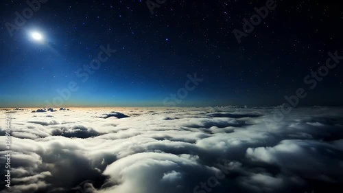 Wallpaper Mural Stunning night sky above a sea of clouds illuminated by the moonlight. A serene and atmospheric view perfect for nature, travel, and celestial-themed projects. Torontodigital.ca
