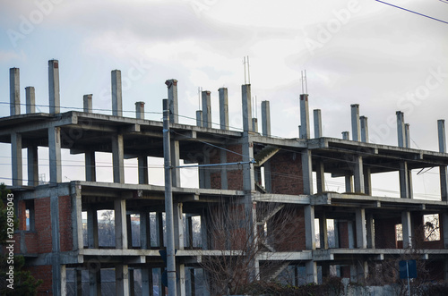 Building under construction, showcasing the development and progress of urban growth. photo